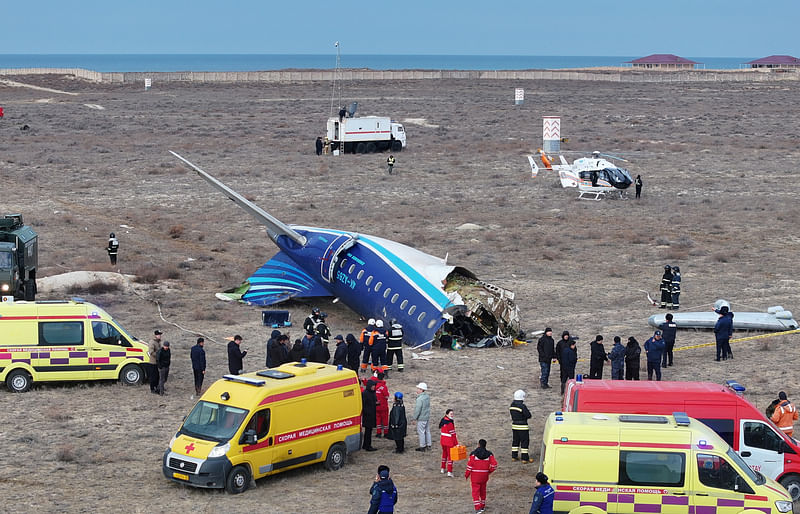 A drone view shows emergency specialists working at the crash site of an Azerbaijan Airlines passenger plane near the city of Aktau, Kazakhstan on 25 December 2024.