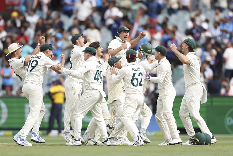 Australian players celebrate the final wicket on day five of the fourth cricket Test match between Australia and India at the Melbourne Cricket Ground (MCG) in Melbourne on 1 December, 2024