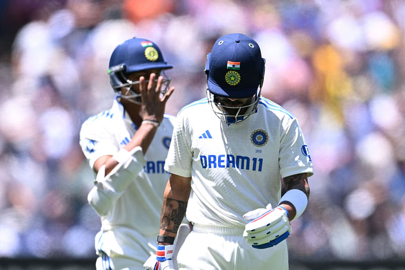 Virat Kohli of India leaves the field after being caught out by Usman Khawaja of Australia off a delivery from Australia’s Mitchell Starc in the Fourth Test at Melbourne Cricket Ground, Melbourne, Australia on 30 December 2024