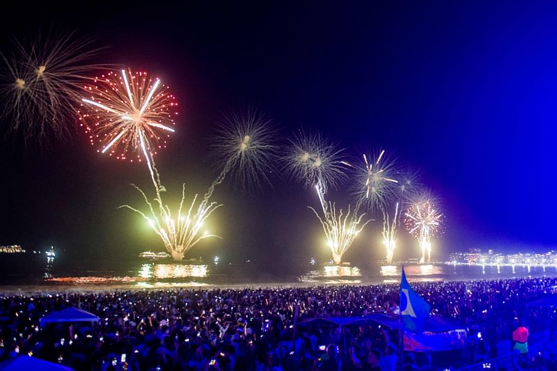 Fireworks explode during the New Year celebration at Copacabana Beach in Rio de Janeiro, Brazil, early on 1 January 2025