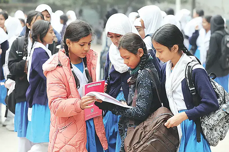 The third and fourth graders got three to four textbooks on the first day of the new year