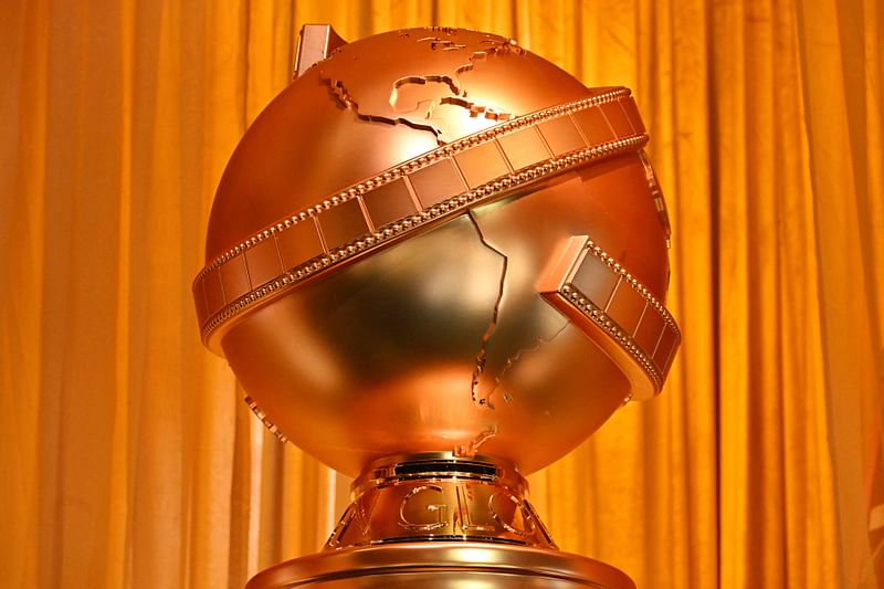 A Golden Globes statue is seen in the ballroom during preparations for the 82nd Annual Golden Globe Awards at the Beverly Hilton hotel in Beverly Hills, California, 2 January, 2025.