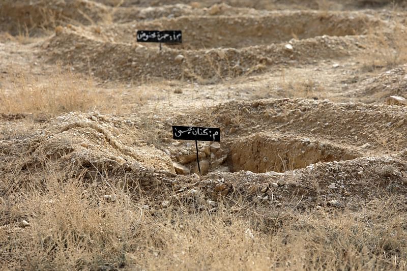 Names of buried people are marked on metallic plaques inside the abandoned Syrian Republican Guard (SRG) base near Damascus on 4 January, 2025. Islamist group Hayat Tahrir al-Sham (HTS) toppled longtime ruler Bashar al-Assad on 8 December.