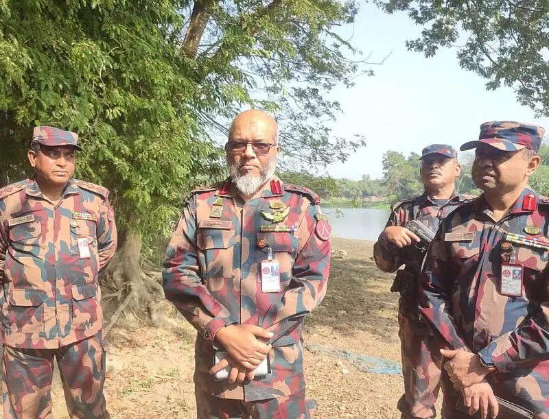 BGB officials exchange views with locals after reclaiming control over the Kodalia river in Maheshpur of Jhenaidah on 6 January 2025.