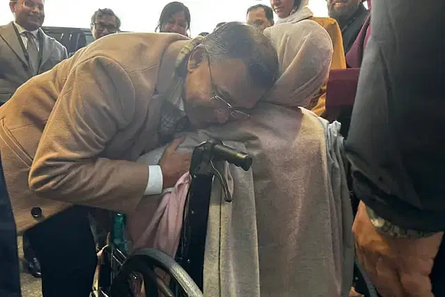 Tarique Rahman embraces his mother Khaleda Zia as she reaches London on 8 January, 2024.