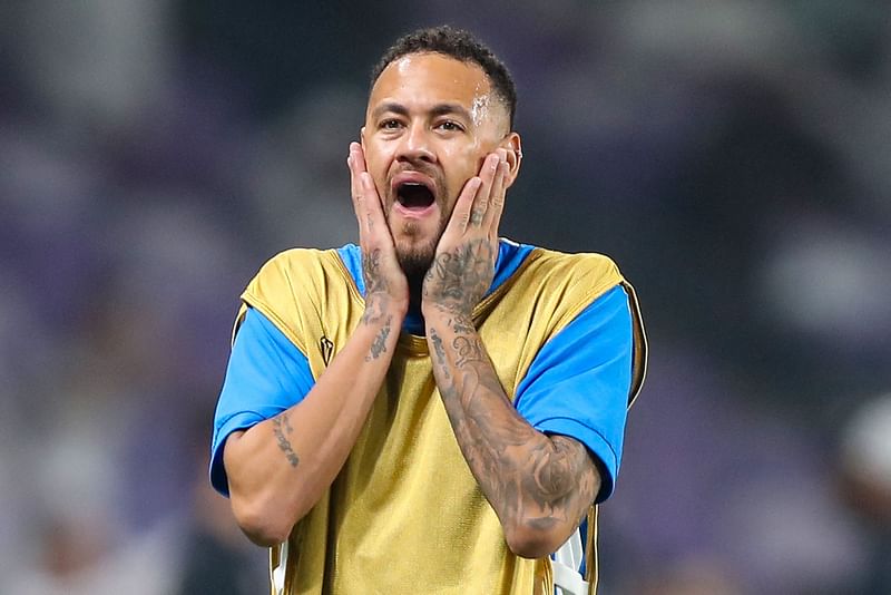 Hilal's Brazilian forward #10 Neymar warms up ahead of the AFC Champions League group B football match between UAE's Al-Ain and Saudi's Al-Hilal at the Hazza bin Zayed Stadium in al-Ain on 21 October, 2024