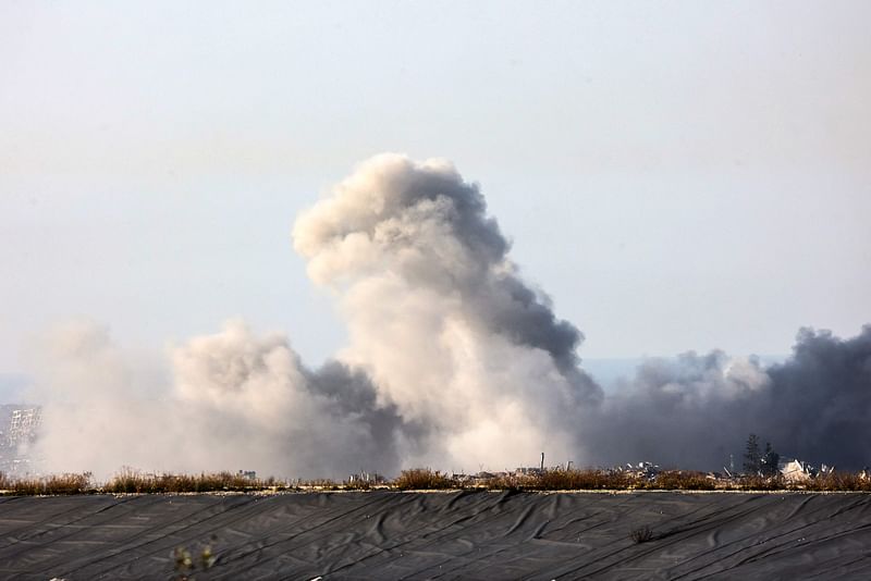 This picture taken from southern Israel shows smoke rising in the northern Gaza Strip during Israeli bombardment on January 8, 2025, amid the ongoing war between Israel and the Hamas.