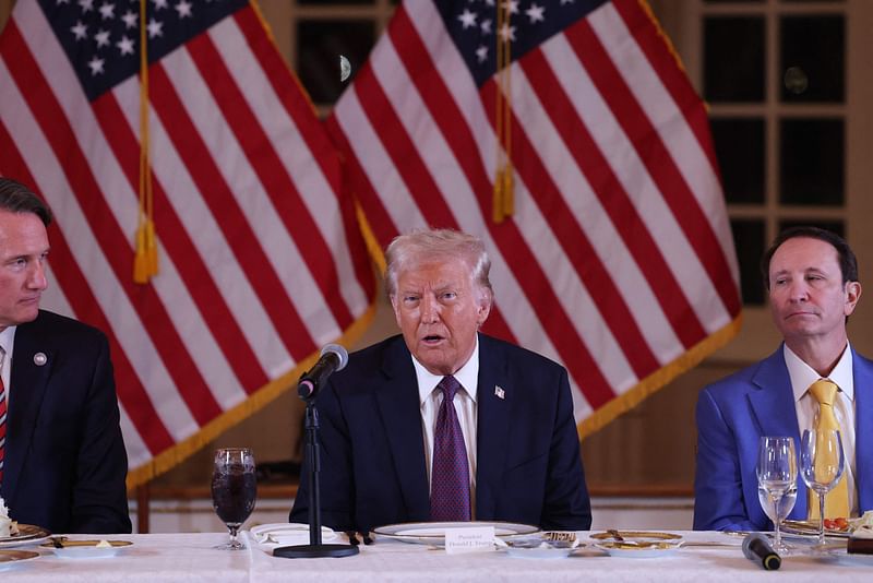 US President-elect Donald Trump (C) speaks during a meeting with Republican governors at the Mar-a-Lago Club on 9 January, 2025 in Palm Beach, Florida. Trump will be sworn in as the 47th president of the United States on 20 January, making him the only president other than Grover Cleveland to serve two non-consecutive terms in office.