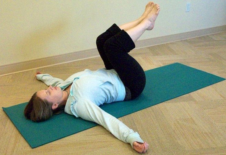 The lying twist also works the oblique muscles and improves flexibility.