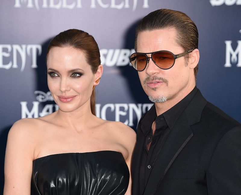 Angelina Jolie and Brad Pitt arrive for the world premiere of Disney's 'Maleficent,' 28 May, 2014, at El Capitan Theatre in Hollywood, California.