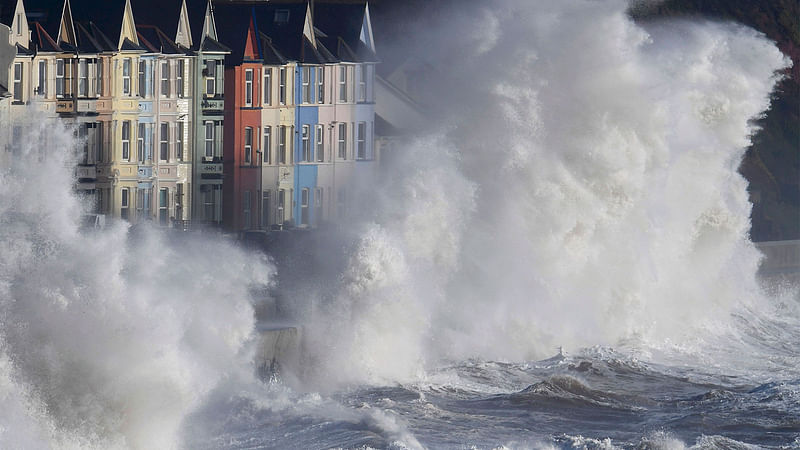 Waves hit the seawall during heavy seas and high winds in Dawlish in south west Britain, 2 February, 2017