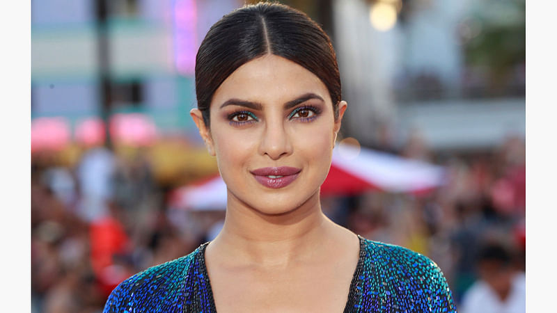 Indian actress Priyanka Chopra poses at the premiere of the film Baywatch in Miami Beach