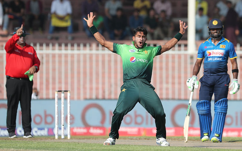 Hasan Ali (R) of Pakistan celebrates after dismissing Lahiru Thirimanna of Sri Lanka during the fifth one day international cricket match at Sharjah Cricket Stadium in Sharjah on Monday. AFP