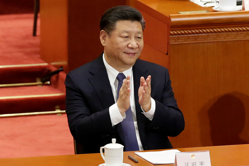 Chinese president Xi Jinping applauds after the parliament passed a constitutional amendment lifting presidential term limit, at the third plenary session of the National People`s Congress (NPC) at the Great Hall of the People in Beijing, China on 11 March, 2018