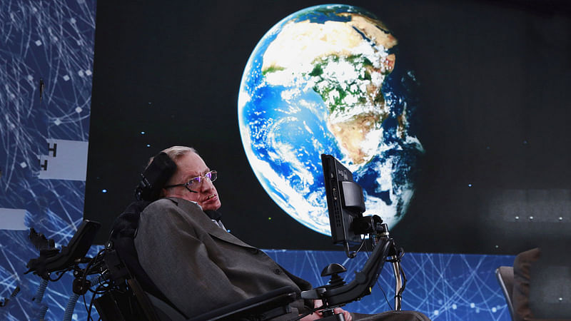 Physicist Stephen Hawking sits on stage during an announcement of the Breakthrough Starshot initiative with investor Yuri Milner in New York 12 April 2016