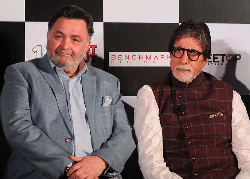 Bollywood actor Rishi Kapoor with Amitabh Bacchan attends a press conference.