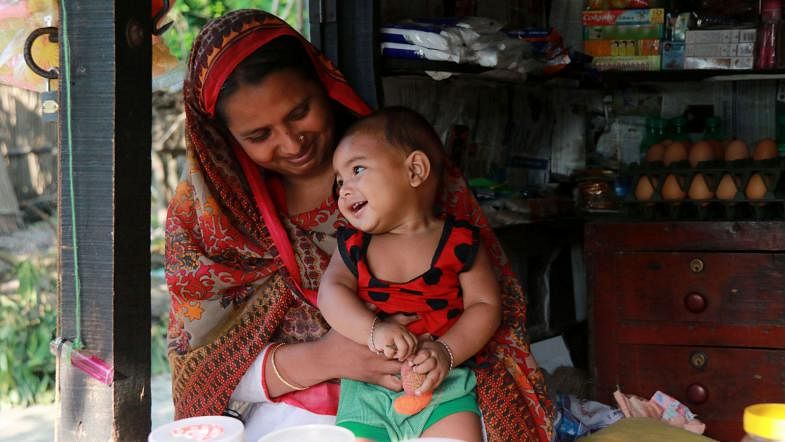 Child and mother. The photo was recently taken from Tingachha, Rajapur, Pabna