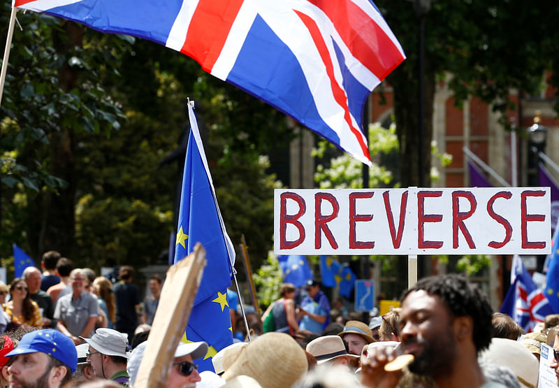 A placard is displayed as EU supporters, calling on the government to give Britons a vote on the final Brexit deal, participate in the `People`s Vote` march in central London, Britain on 23 June 2018.