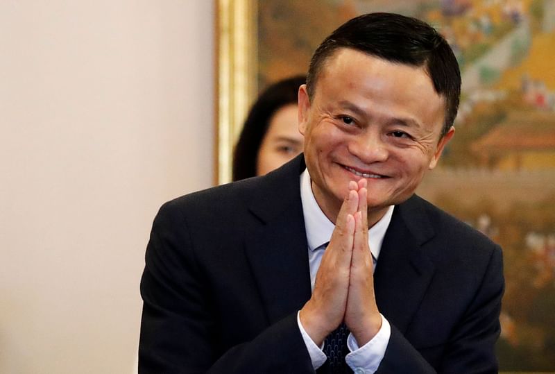 In this file photo taken on 18 April, 2018, Alibaba founder Jack Ma gestures as he arrives for a meeting with Thailand`s prime minister Prayuth Chan-ocha in Bangkok during a visit to the country to announce the group`s investment in the Thai government`s Eastern Economic Corridor (EEC) scheme. Photo: AFP