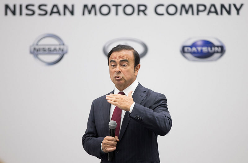 This file photo taken on 11 January 2016 shows Carlos Ghosn, chairman, president and chief executive officer of Nissan Motor, speaking to reporters during a press conference at the 2016 North American International Auto Show in Detroit, Michigan.