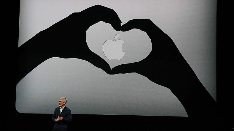 In this file photo taken on 30 October 2018 Apple CEO Tim Cook presents new products, including new Macbook laptops, during a special event at the Brooklyn Academy of Musicin New York.