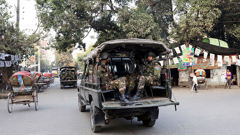 Bangladesh Army patrols on the street