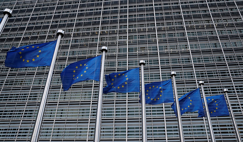 European Union flags flutter outside the EU Commission headquarters in Brussels, Belgium