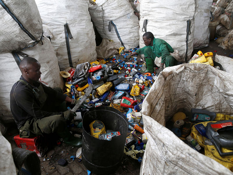 Employees sort plastic waste before the wet recycling process at the Mr Green plastic recycling factory in Nairobi, Kenya on 25 June 2018.