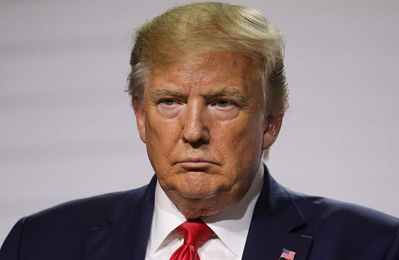 US president Donald Trump looks on during a joint-press conference with French President Emmanuel Macron in Biarritz, south-west France on 26 August 2019, on the third day of the annual G7 Summit attended by the leaders of the world`s seven richest democracies, Britain, Canada, France, Germany, Italy, Japan and the United States. Photo: AFP