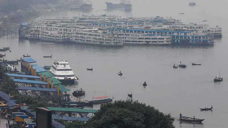 Water vessels have been anchored in safer places near Sadarghat launch terminal on the Buriganga river