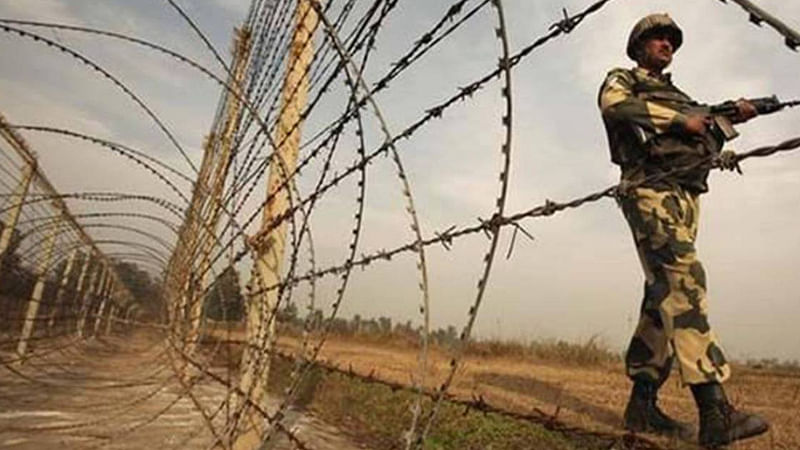 A BSF member patrols the border area