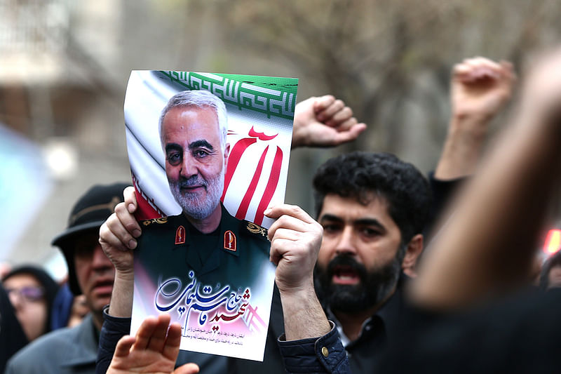 Iranian demonstrators chant slogans during a protest against the assassination of the Iranian major-general Qassem Soleimani, head of the elite Quds Force, and Iraqi militia commander Abu Mahdi al-Muhandis, who were killed in an air strike at Baghdad airport, in front of United Nation office in Tehran, Iran 3 January, 2020