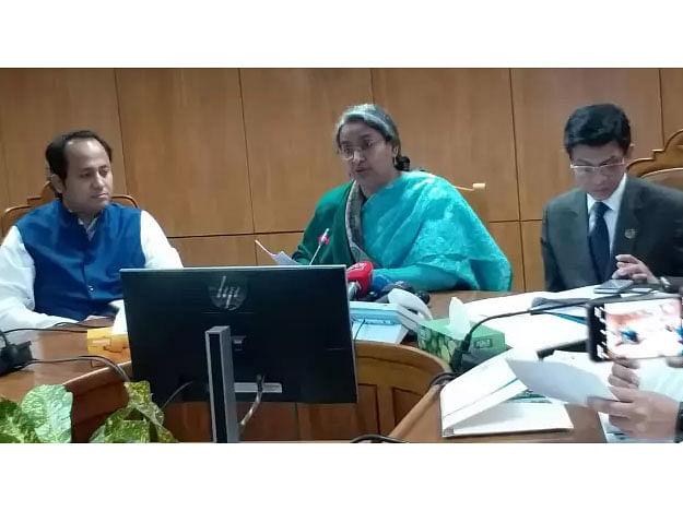 Education minister Dipu Moni speaks as deputy minister for education Mohibul Hasan Chowdhury Nowfel listens