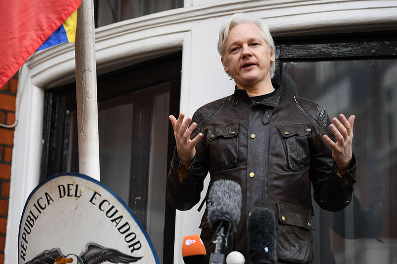 In this file photo taken on 19 May 2017 Wikileaks founder Julian Assange speaks on the balcony of the embassy of Ecuador in London.