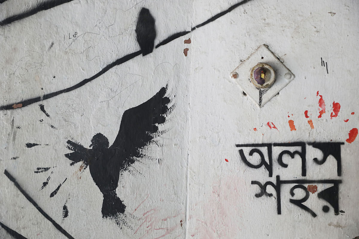 বুয়েটের দেয়ালে ‘অলস শহর’-এর চিত্র। বাংলাদেশ প্রকৌশল বিশ্ববিদ্যালয়, ঢাকা, ১৬ এপ্রিল। ছবি: আবদুস সালাম