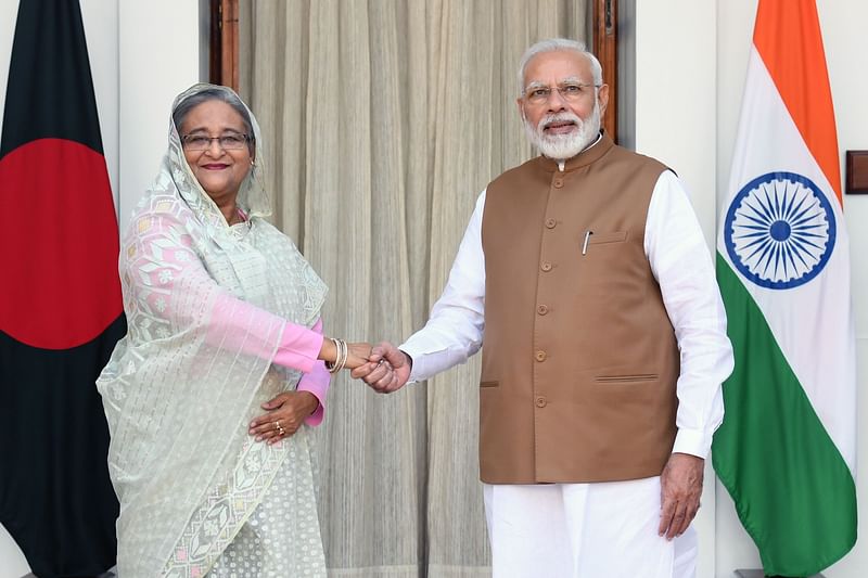 বাংলাদেশের প্রধানমন্ত্রী শেখ হাসিনা ও ভারতের প্রধানমন্ত্রী নরেন্দ্র মোদি নয়দিল্লিতে বৈঠক করেন। ছবি: এএফপি