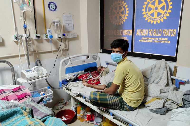 Mahbub, the grandson of Mokammel Hossain, who is undergoing treatment in Corona Ward. June 3 at Kushtia General Hospital