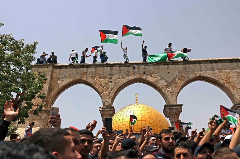 Palestinians protest on the grounds of Al Aqsa Mosque
