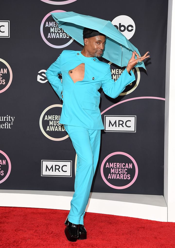 American actor, music star and writer Billy Porter has appeared wearing a hat.  He has a reputation for wearing all the 'weird' clothes