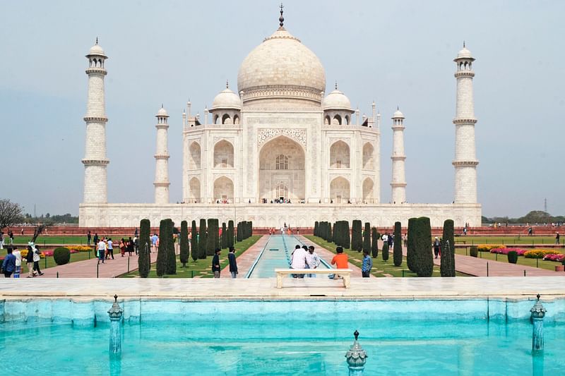 A low number of tourists are seen at Taj Mahal amid concerns over the spread of the COVID-19 novel coronavirus, in Agra on 16 March, 2020. Photo: AFP