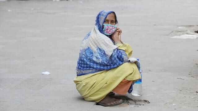 Hamida Begum has lost her source of income due to lockdown. Now she awaits relief. Photo: Abdus Salam