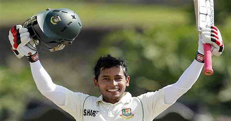 Mushfiqur Rahim raises his bat to celebrate in Galle, 2013, after becoming the first Bangladeshi to score a double century in Test cricket. Photo: AP