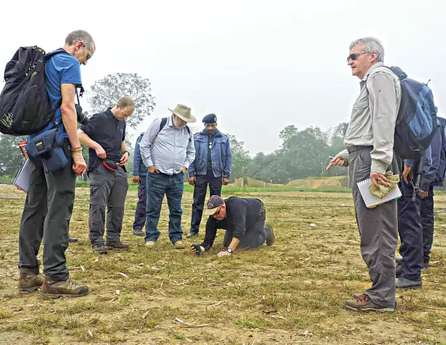 A delegation of US consultants examines surface of Tengratila gas field area to assess the damage in 2016. Prothom Alo File Photo