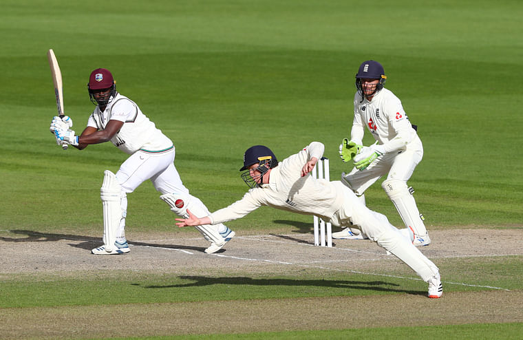 England's Ollie Pope catches out West Indies' Kemar Roach to win the test at Emirates Old Trafford, Manchester, Britain on 20 July, 2020