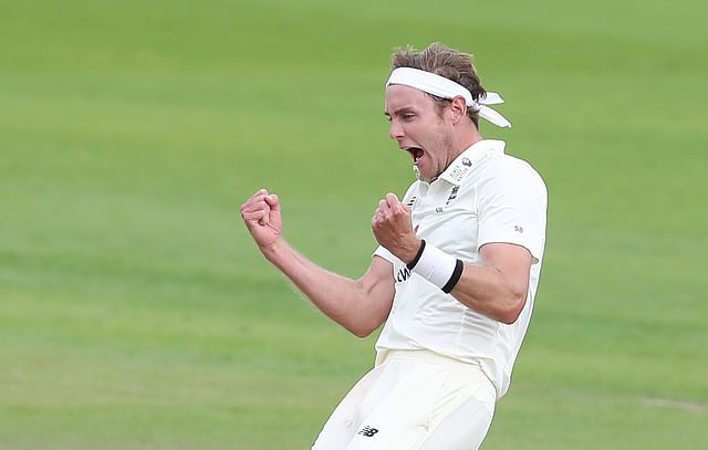 England's Stuart Broad celebrates the wicket of West Indies' Roston Chase, as play resumes behind closed doors following the outbreak of the coronavirus (COVID-19) in Emirates Old Trafford, Manchester, Britain on 25 July, 2020