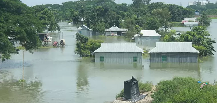 Houses beside river Brahmaputra sit in floods amid deteriorating flood situation at Char Kalibari, Mymensingh, 25 July 2020