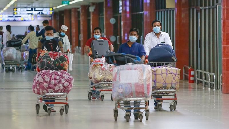 Migrant workers return from the Middle East countries. The photo was captured at Hazrat Shahjalal International Airport on 12 August 2020. 