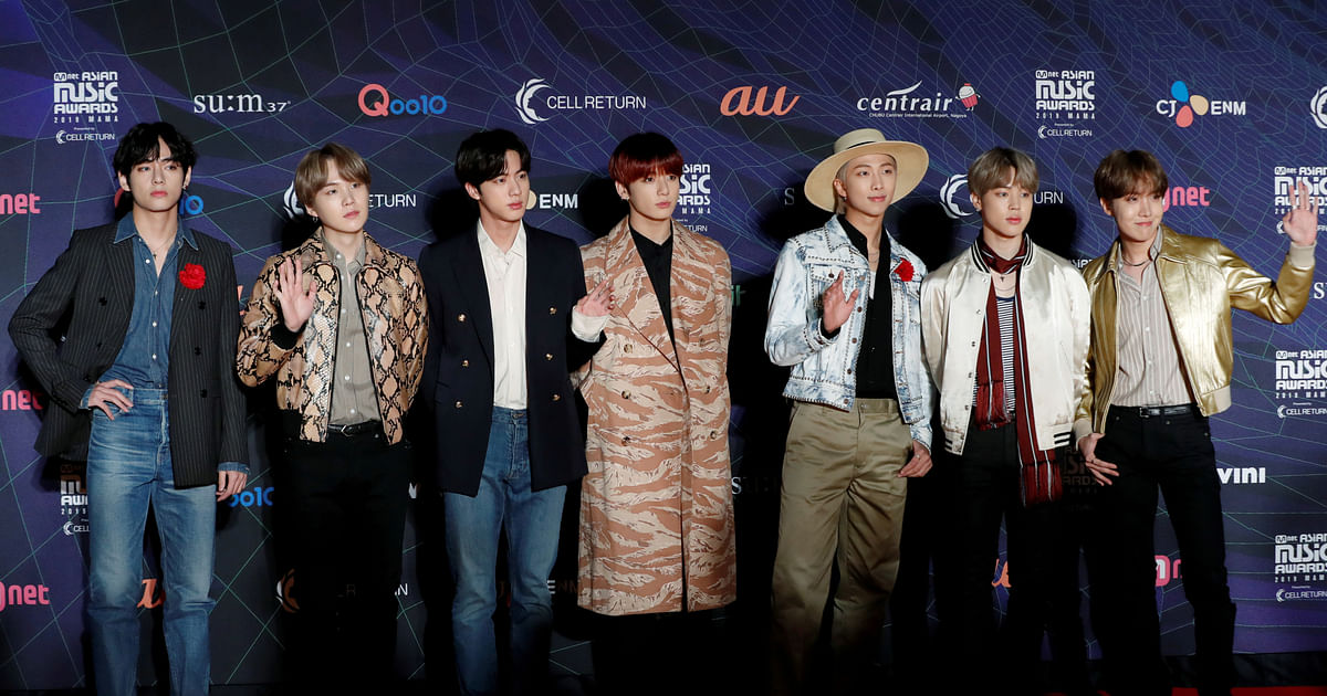 BTS stuns in Louis Vuitton outfits ahead of fashion show