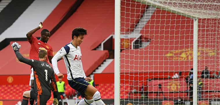  Tottenham Hotspur's South Korean striker Son Heung-Min scores his team's fourth goal during the English Premier League football match between Manchester United and Tottenham Hotspur at Old Trafford in Manchester, north west England, on 4 October 2020.