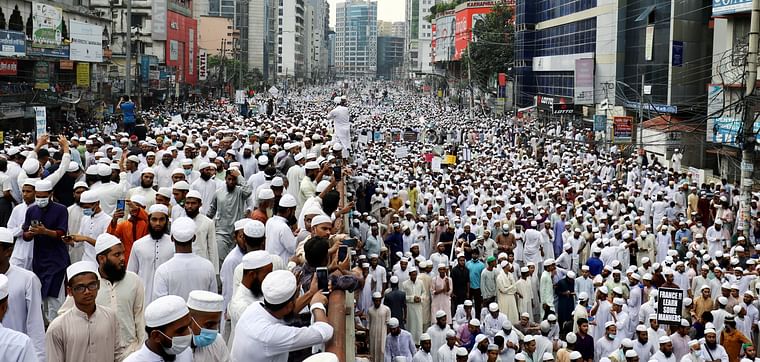 Supporters and activists of the Hefazat-e-Islam Bangladesh, an islamist political party, march towards a French embassy as they take part in a protest calling for the boycott of French products and denouncing French president Emmanuel Macron for his comments over Prophet Mohammed's caricatures, in Dhaka, Bangladesh, on 2 November 2020